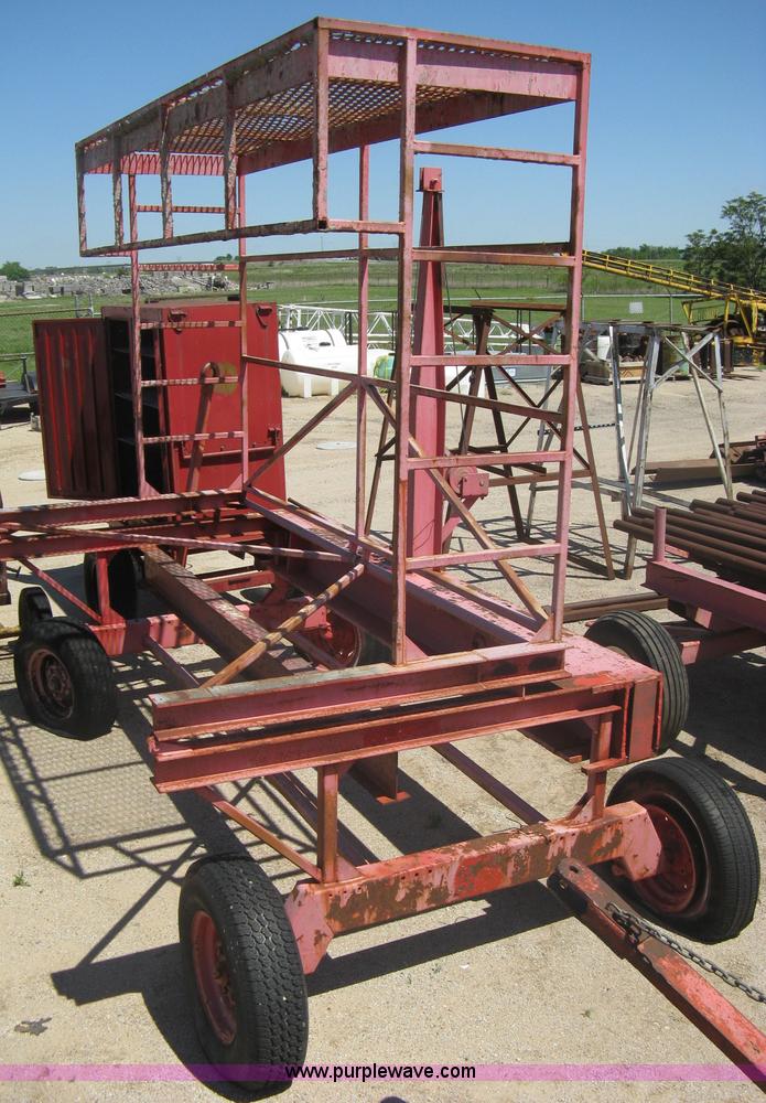 image for item A6266 Wagon running gear with manual lift and tilt working man basket