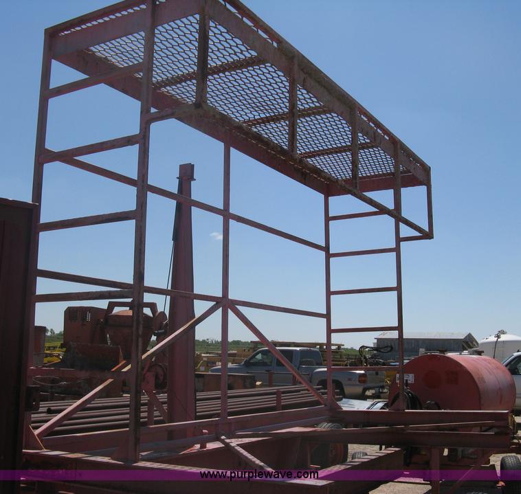 image for item A6266 Wagon running gear with manual lift and tilt working man basket