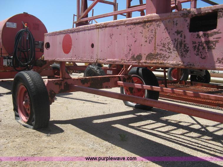 image for item A6266 Wagon running gear with manual lift and tilt working man basket