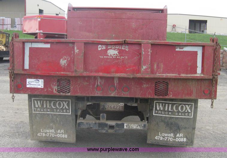 image for item A6307 1991 Ford F700 flatbed dump truck