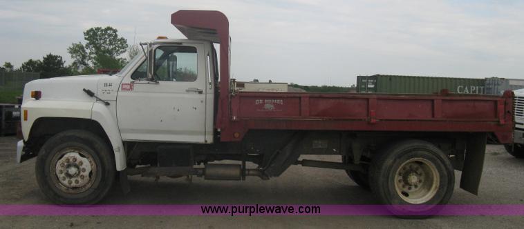 image for item A6307 1991 Ford F700 flatbed dump truck