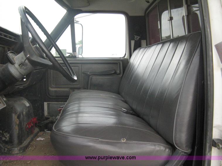 image for item A6307 1991 Ford F700 flatbed dump truck