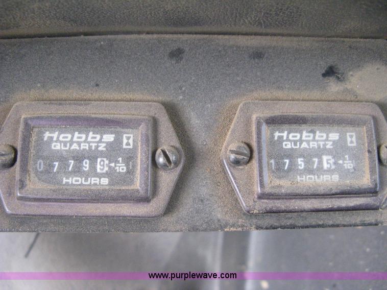 image for item A6307 1991 Ford F700 flatbed dump truck