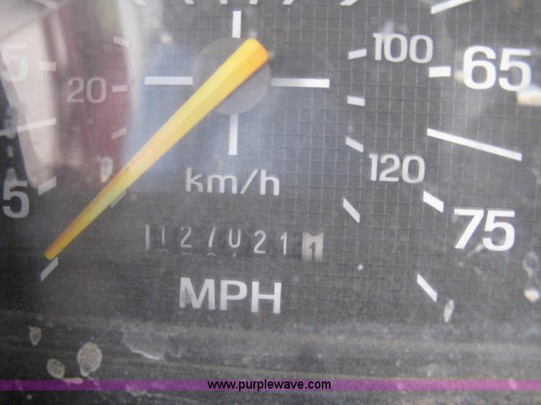 image for item A6307 1991 Ford F700 flatbed dump truck