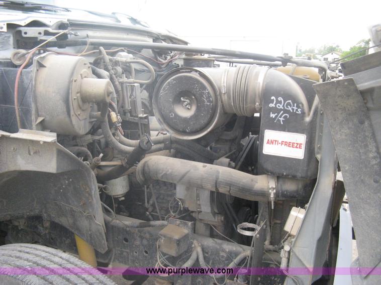 image for item A6307 1991 Ford F700 flatbed dump truck