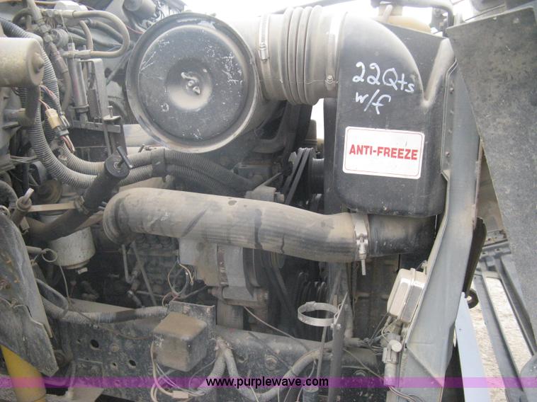 image for item A6307 1991 Ford F700 flatbed dump truck