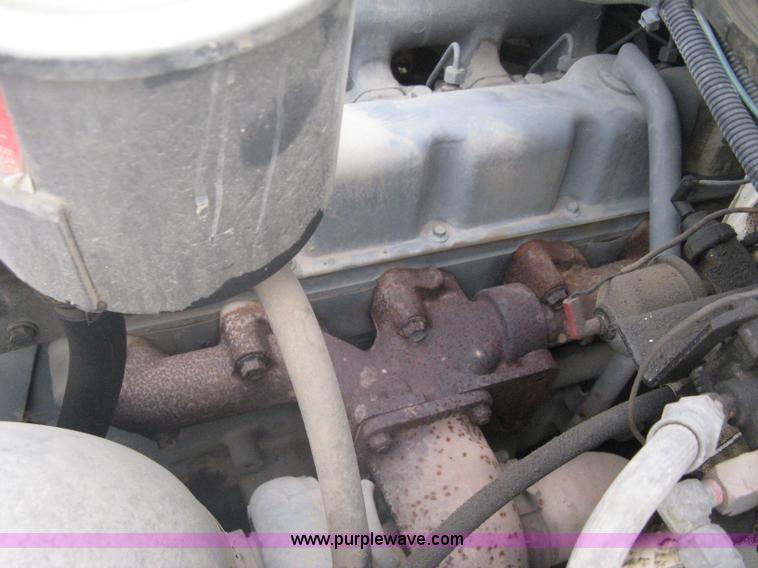 image for item A6307 1991 Ford F700 flatbed dump truck