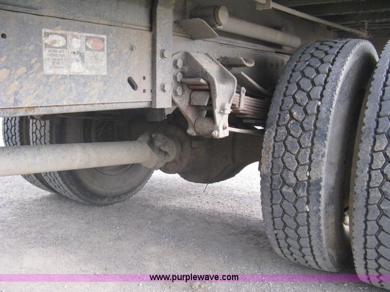 image for item A6307 1991 Ford F700 flatbed dump truck