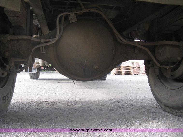 image for item A6307 1991 Ford F700 flatbed dump truck