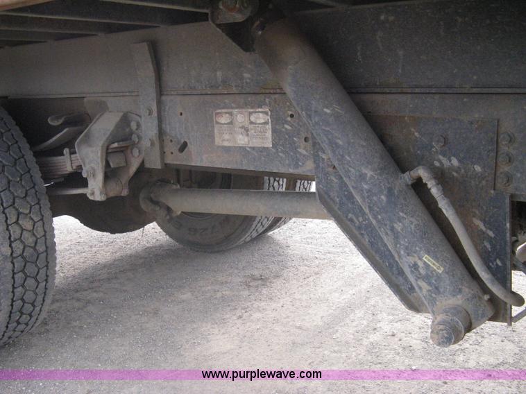 image for item A6307 1991 Ford F700 flatbed dump truck