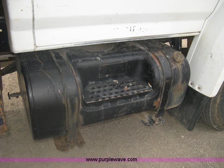 image for item A6307 1991 Ford F700 flatbed dump truck