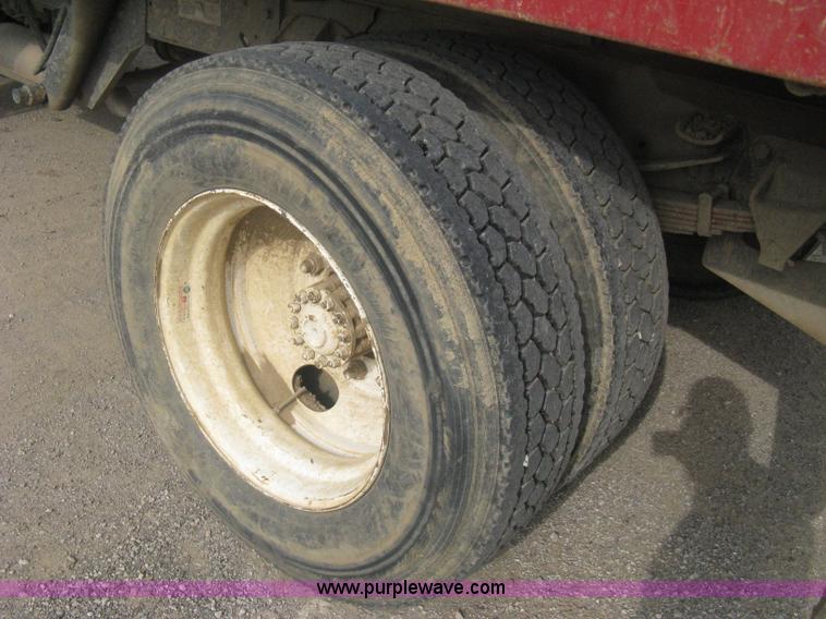 image for item A6307 1991 Ford F700 flatbed dump truck