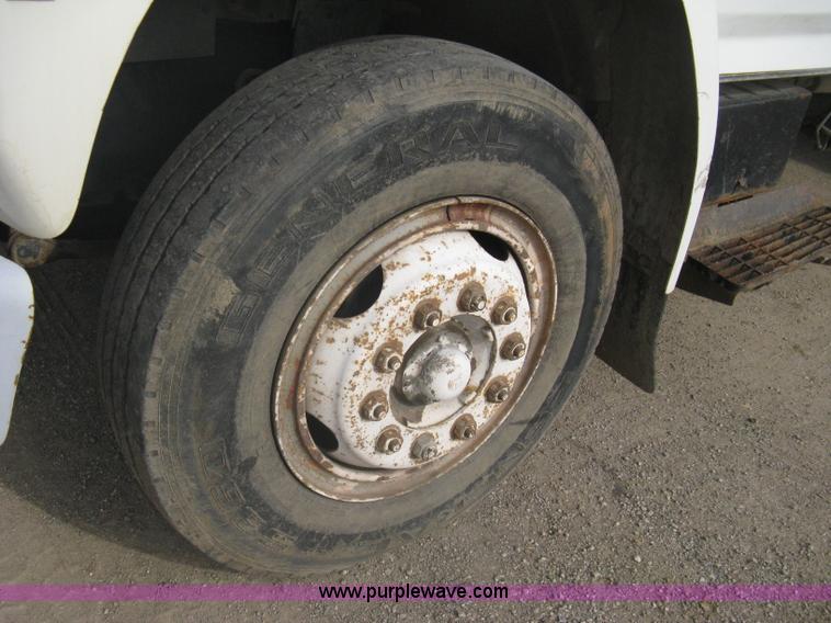 image for item A6307 1991 Ford F700 flatbed dump truck