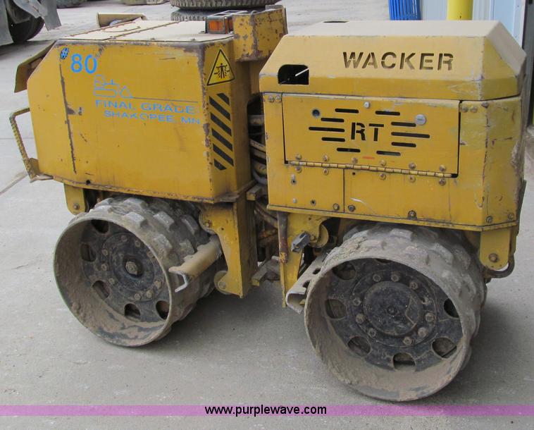 image for item A8021 Wacker RT820 walk behind trench compactor