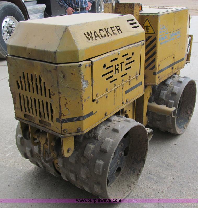 image for item A8021 Wacker RT820 walk behind trench compactor