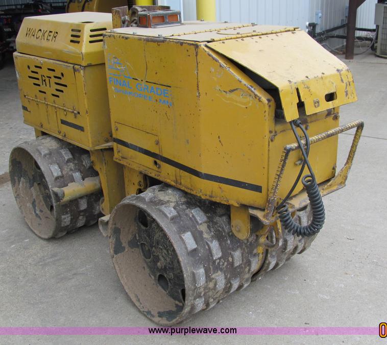 image for item A8021 Wacker RT820 walk behind trench compactor