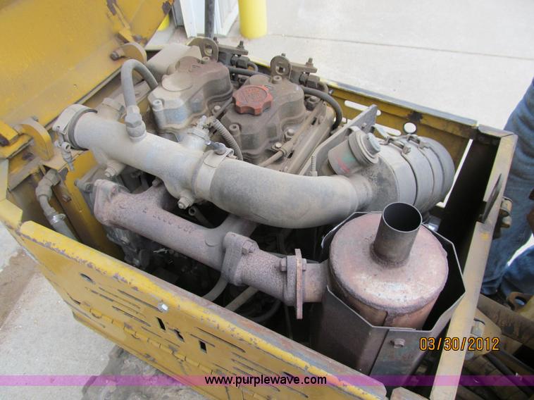 image for item A8021 Wacker RT820 walk behind trench compactor