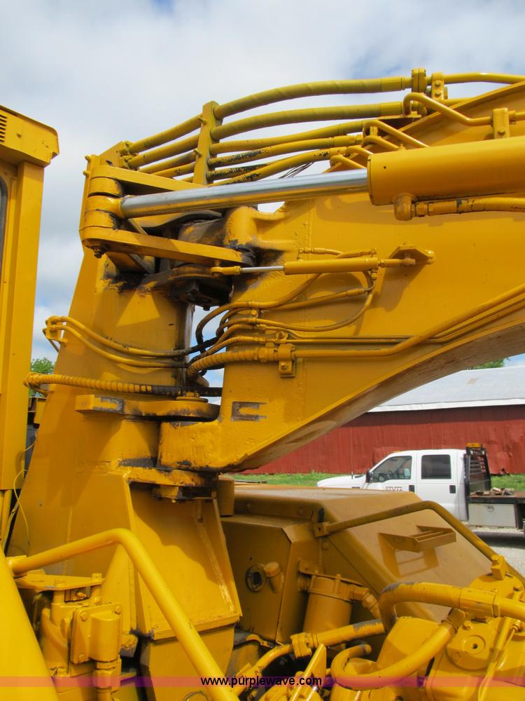 image for item B2697 1983 John Deere 762 paddle wheel scraper