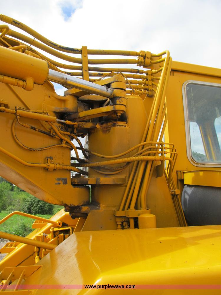 image for item B2697 1983 John Deere 762 paddle wheel scraper