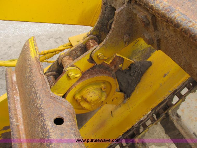 image for item B2697 1983 John Deere 762 paddle wheel scraper