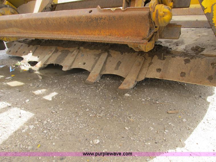 image for item B2697 1983 John Deere 762 paddle wheel scraper