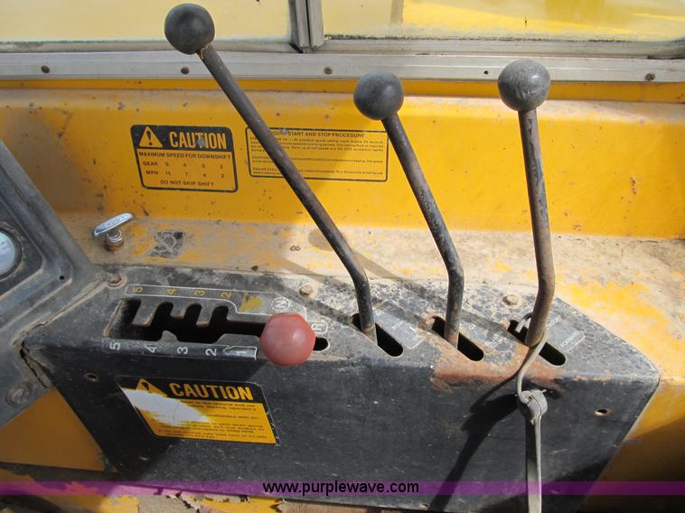 image for item B2697 1983 John Deere 762 paddle wheel scraper