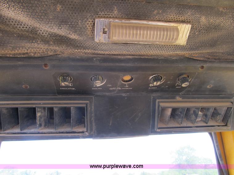 image for item B2697 1983 John Deere 762 paddle wheel scraper