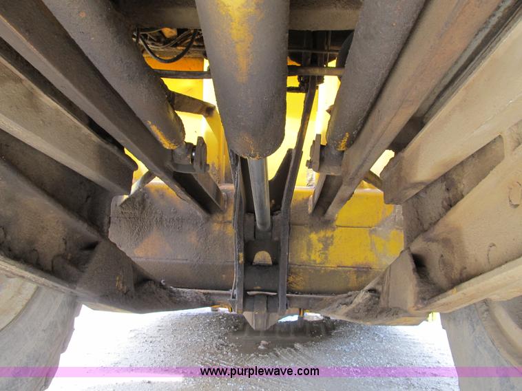 image for item B2697 1983 John Deere 762 paddle wheel scraper