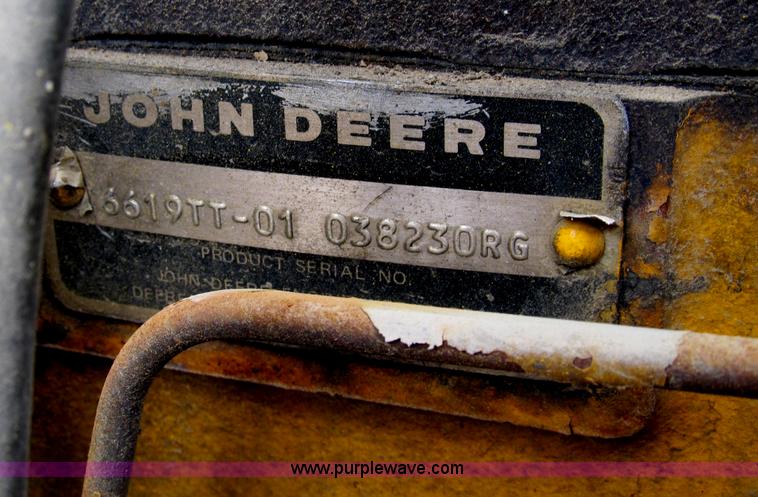 image for item B2697 1983 John Deere 762 paddle wheel scraper