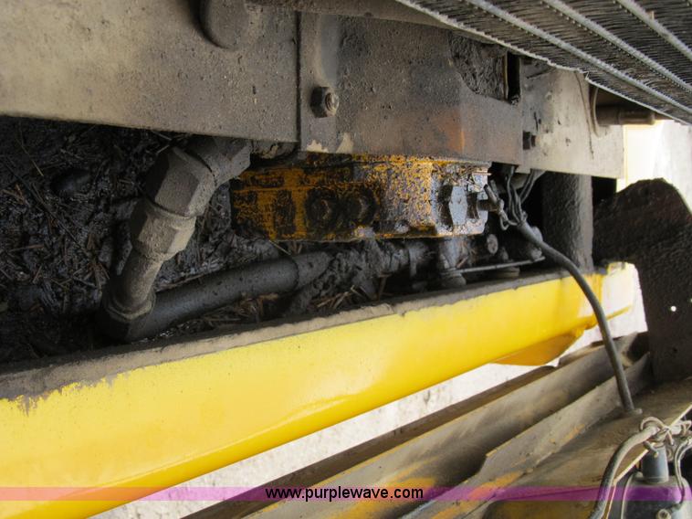 image for item B2697 1983 John Deere 762 paddle wheel scraper