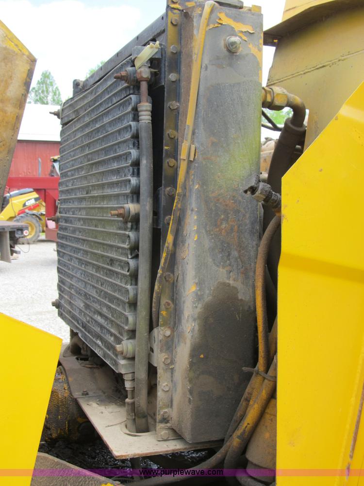 image for item B2697 1983 John Deere 762 paddle wheel scraper