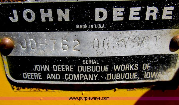 image for item B2697 1983 John Deere 762 paddle wheel scraper