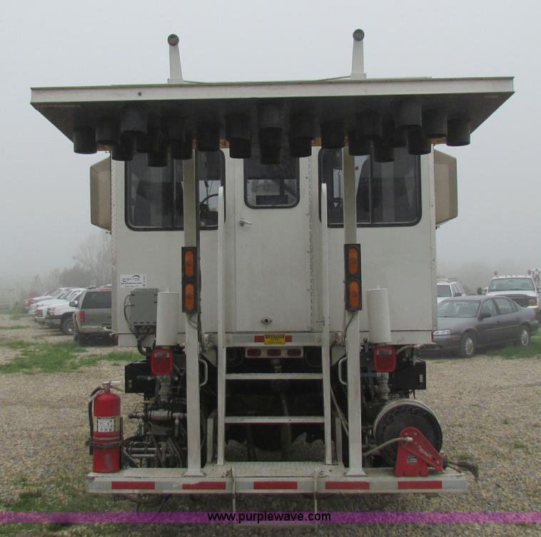 image for item B7225 2006 GMC T8500 paint striper truck