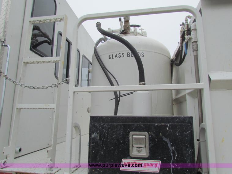 image for item B7225 2006 GMC T8500 paint striper truck