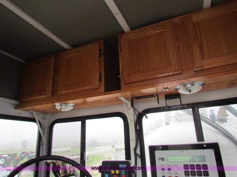 image for item B7225 2006 GMC T8500 paint striper truck