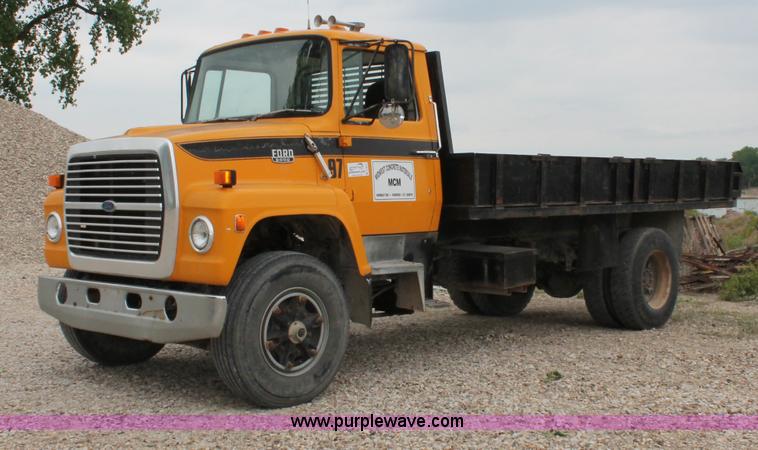 image for item D4013 1984 Ford 8000 Flatbed Dump Truck