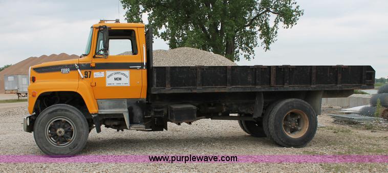 image for item D4013 1984 Ford 8000 Flatbed Dump Truck