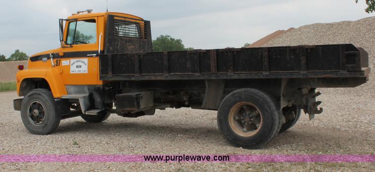 image for item D4013 1984 Ford 8000 Flatbed Dump Truck