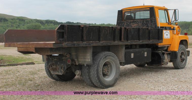 image for item D4013 1984 Ford 8000 Flatbed Dump Truck