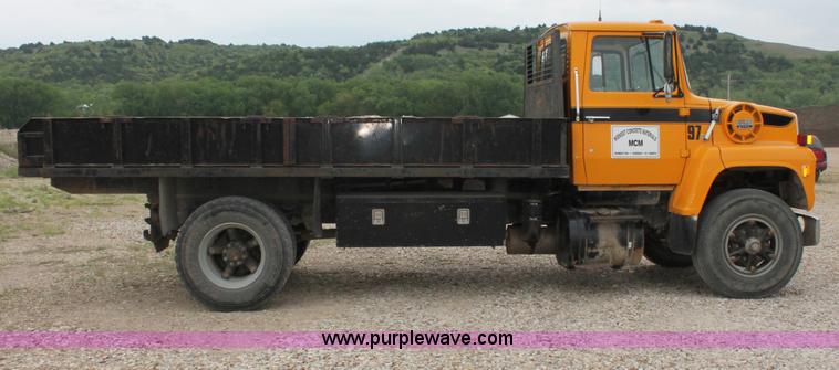 image for item D4013 1984 Ford 8000 Flatbed Dump Truck