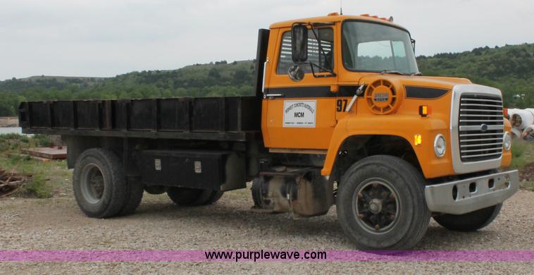image for item D4013 1984 Ford 8000 Flatbed Dump Truck