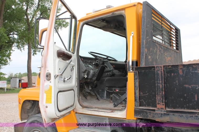 image for item D4013 1984 Ford 8000 Flatbed Dump Truck