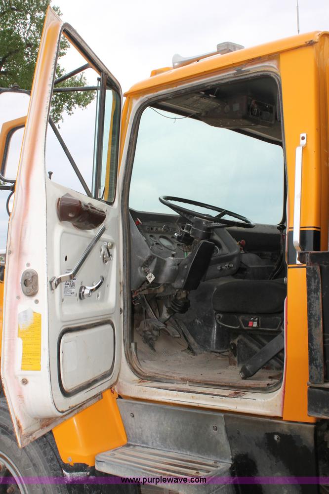 image for item D4013 1984 Ford 8000 Flatbed Dump Truck