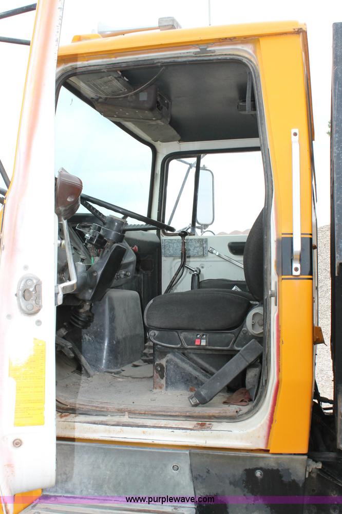 image for item D4013 1984 Ford 8000 Flatbed Dump Truck