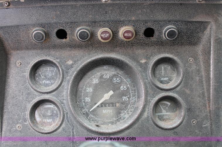 image for item D4013 1984 Ford 8000 Flatbed Dump Truck