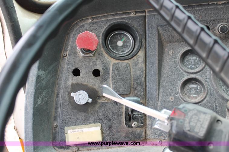 image for item D4013 1984 Ford 8000 Flatbed Dump Truck