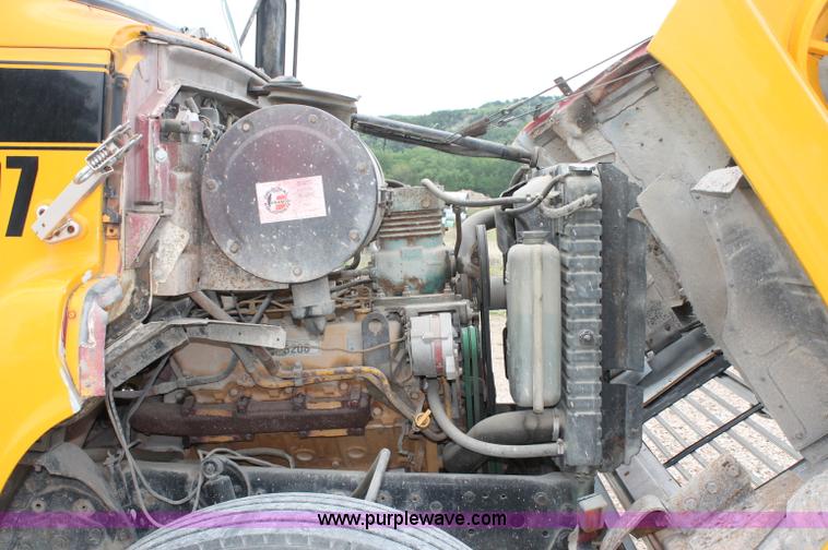 image for item D4013 1984 Ford 8000 Flatbed Dump Truck