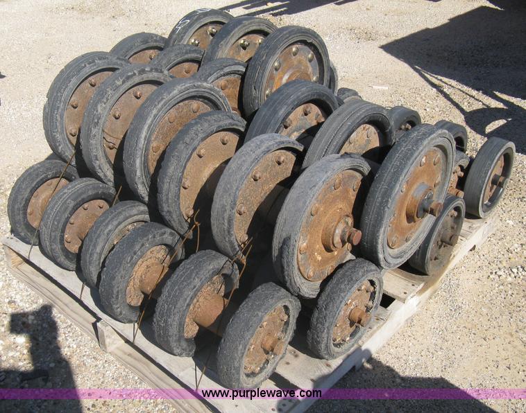 image for item G9811 Caterpillar 277 skid loader undercarriage rollers