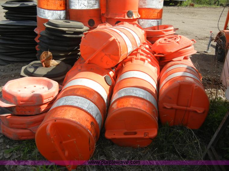 image for item K9072 Approximately 70 roadside barrels and bases