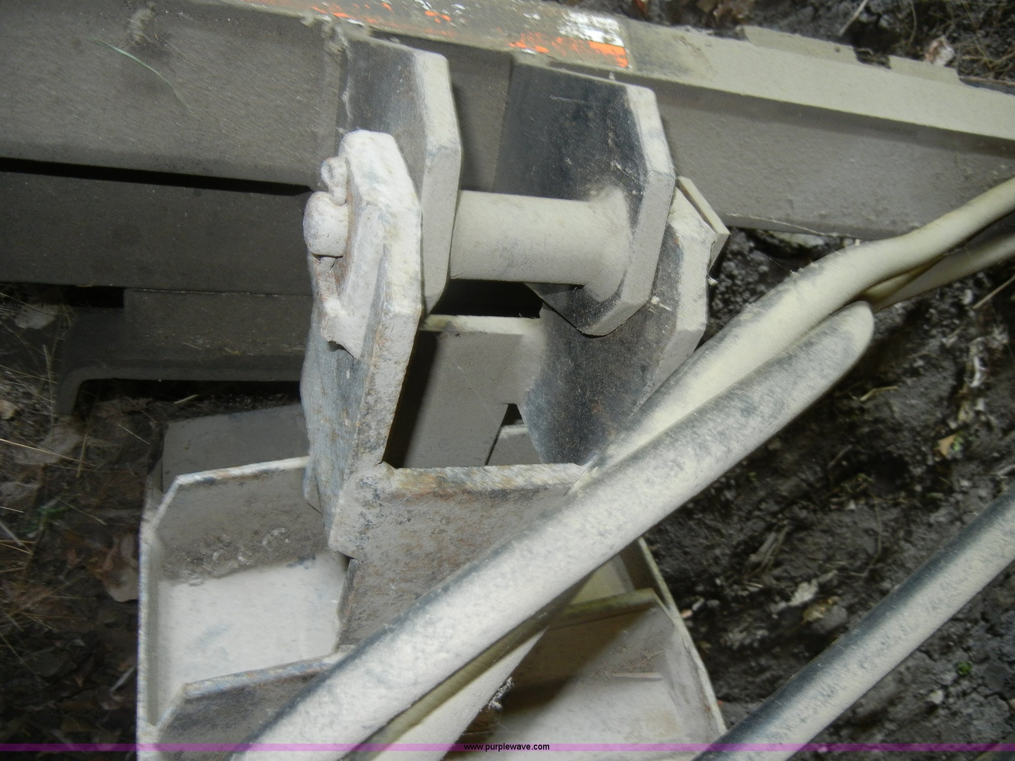 Lowe hydraulic post hole digger skid steer attachment in KS